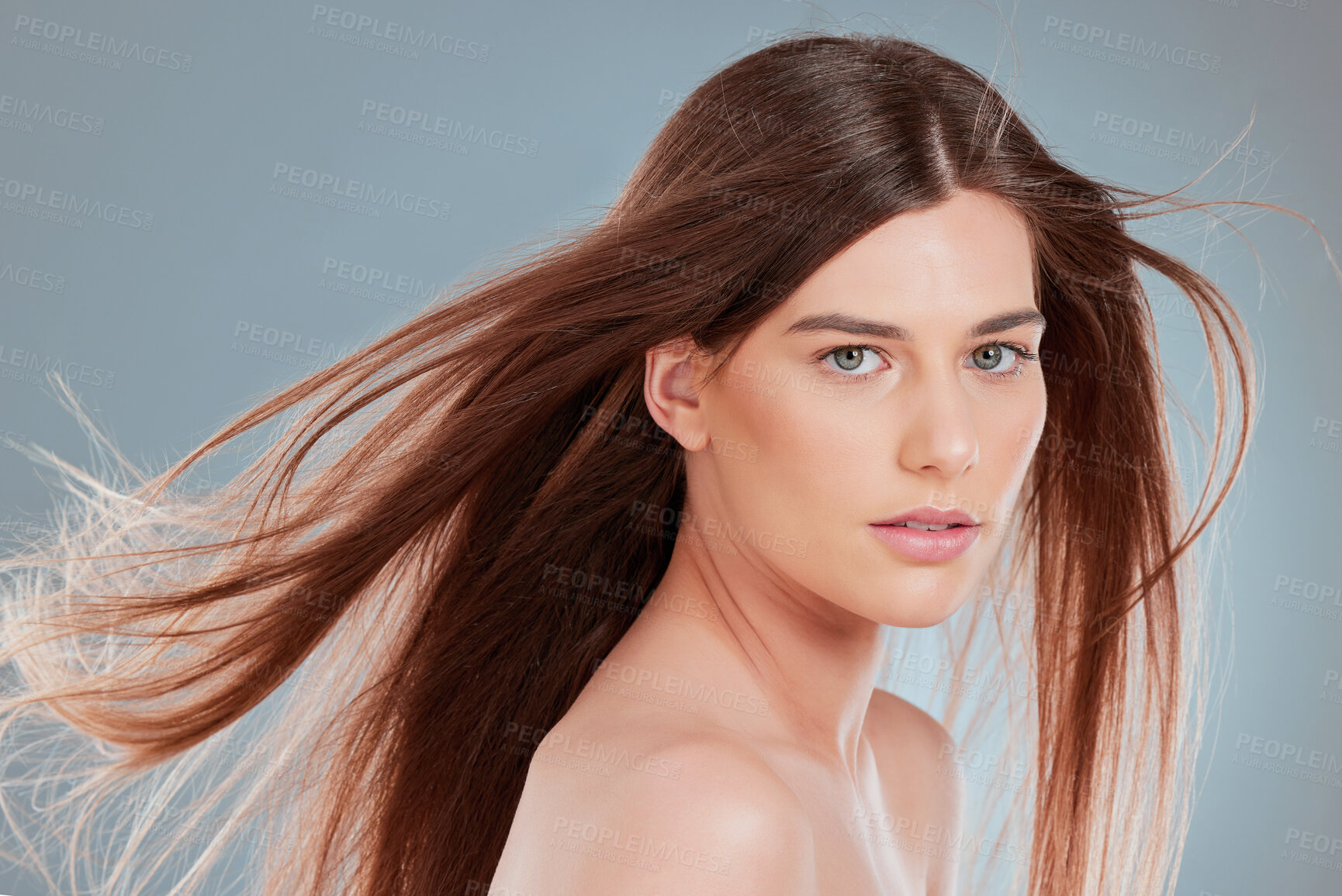 Buy stock photo Hair care, wind and portrait of woman in studio for salon treatment, results or satisfaction. Relax, serious and female person with confidence for shampoo growth, shine or wellness on gray background