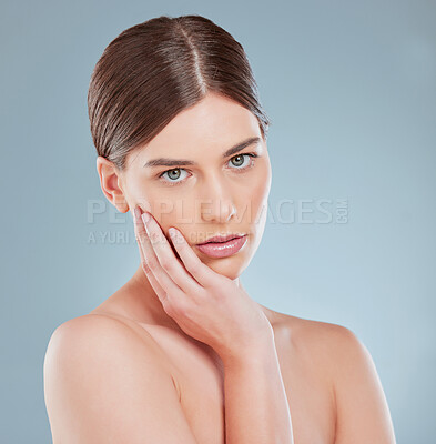 Buy stock photo Studio shot of a beautiful young woman with flawless skin