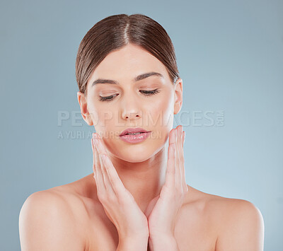 Buy stock photo Studio shot of a beautiful young woman with flawless skin