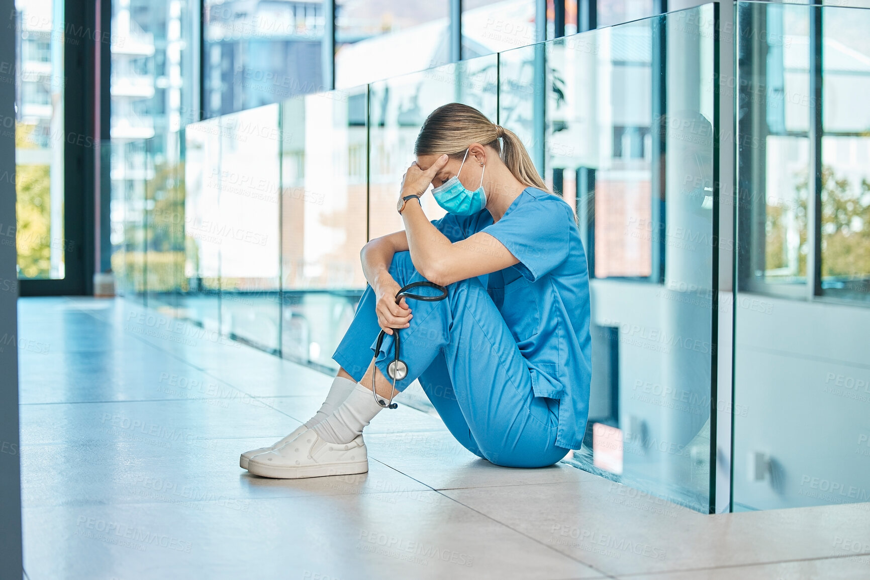 Buy stock photo Health, doctor and tired woman on floor for burnout, mistake or surgery fail in hospital. Stress, healthcare and sad female physician with face mask in clinic for fatigue, medical crisis or loss