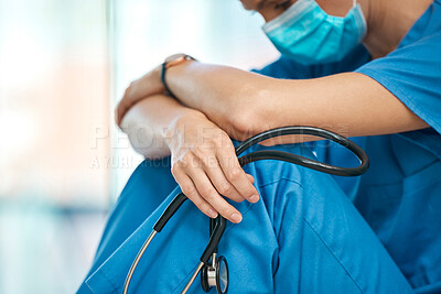 Buy stock photo Covid tired, depression and a doctor in healthcare with a fail, mistake or danger at a hospital. Sad, burnout and female nurse with a face mask, mental health problem and stethoscope after surgery