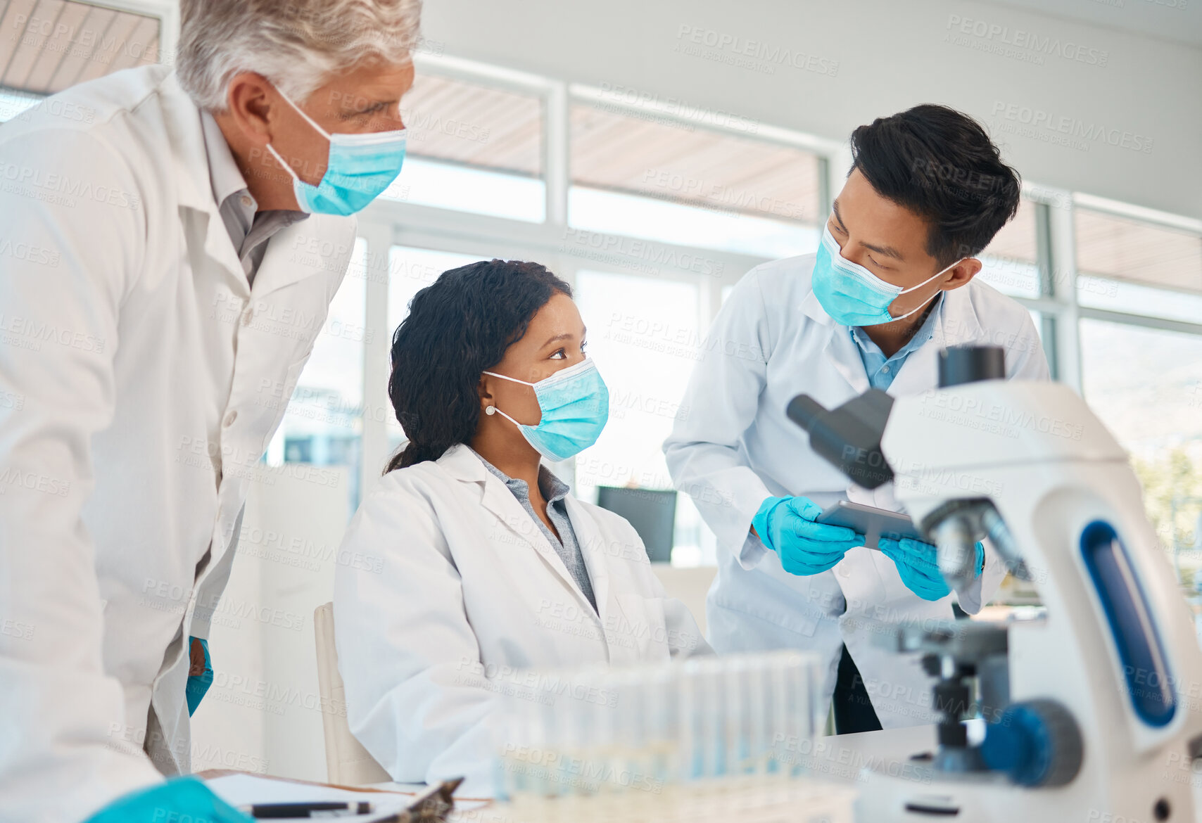 Buy stock photo Mask, teamwork and scientist in laboratory with discussion, compliance and safety regulations for experiment. Healthcare, men and woman for medical research, vaccine vial or planning in collaboration