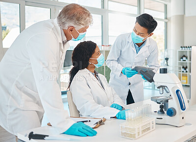 Buy stock photo Research, teamwork and employees in lab for healthcare innovation, medical analytics or science. Medicine, education and scientists collaboration with face mask and ppe to study liquid or chemical