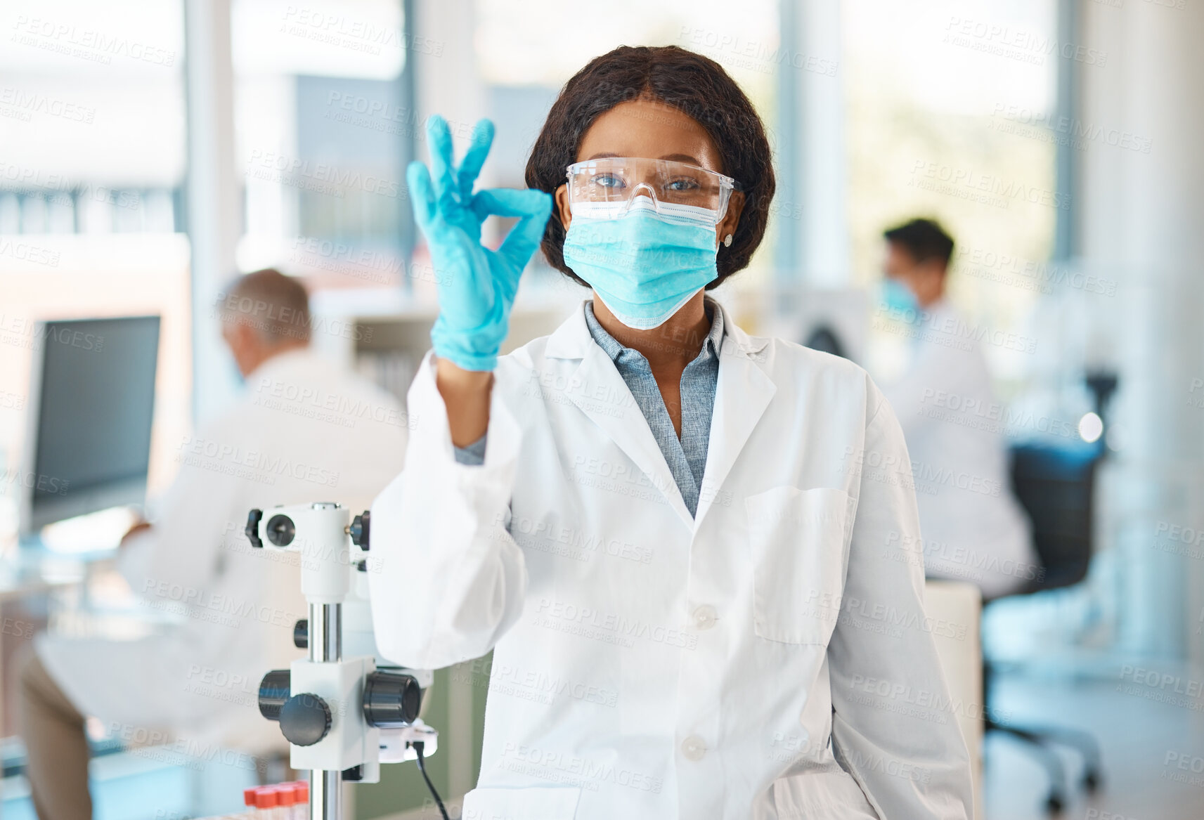 Buy stock photo Black woman, scientist and happy with ok sign at lab for drug trial or test and proud. Portrait, confident and smile with medical or science research for healthcare investigation with wearing mask 