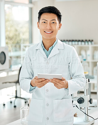 Buy stock photo Happy, portrait and an Asian scientist with a tablet for research, medical planning and innovation. Smile, futuristic and a male lab worker with technology for science, online physics and internet