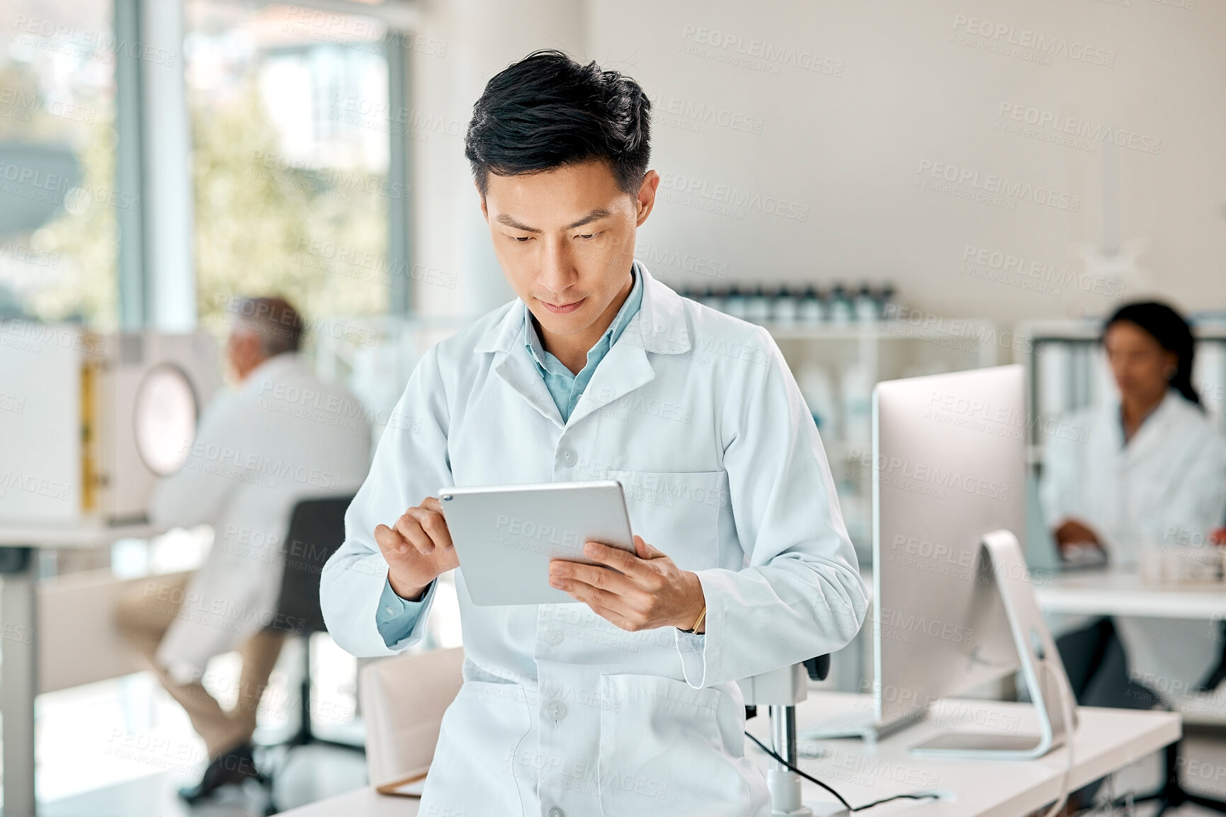 Buy stock photo Science, man and internet with tablet in laboratory to monitor experiment, scientific analysis and medical research for study. Technology, online and digital for trial results, breakthrough and cure