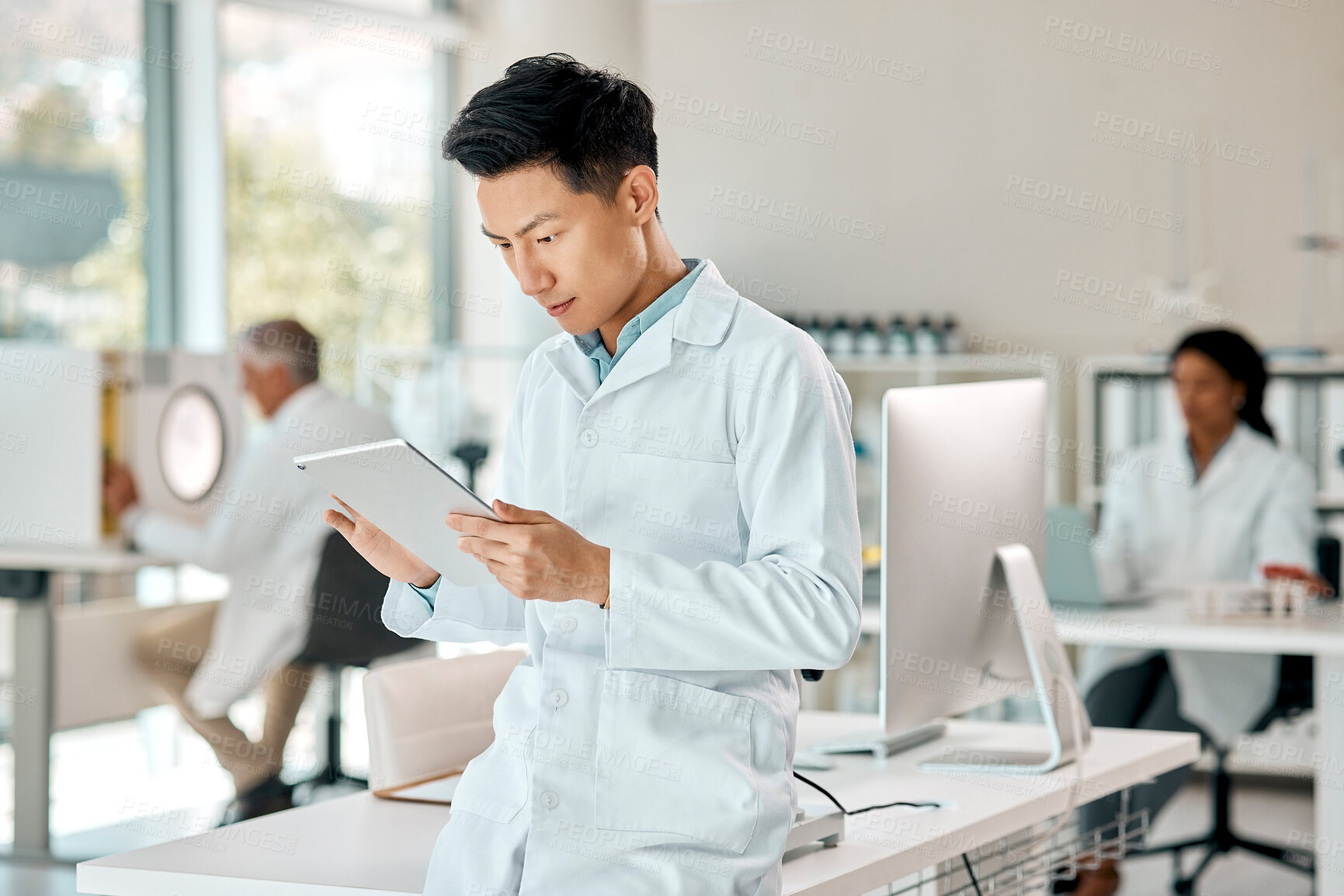 Buy stock photo Scientist, man and online with tablet in laboratory for monitor experiment, science analysis and medical research for study. Technology, internet and digital for trial results, breakthrough and cure.