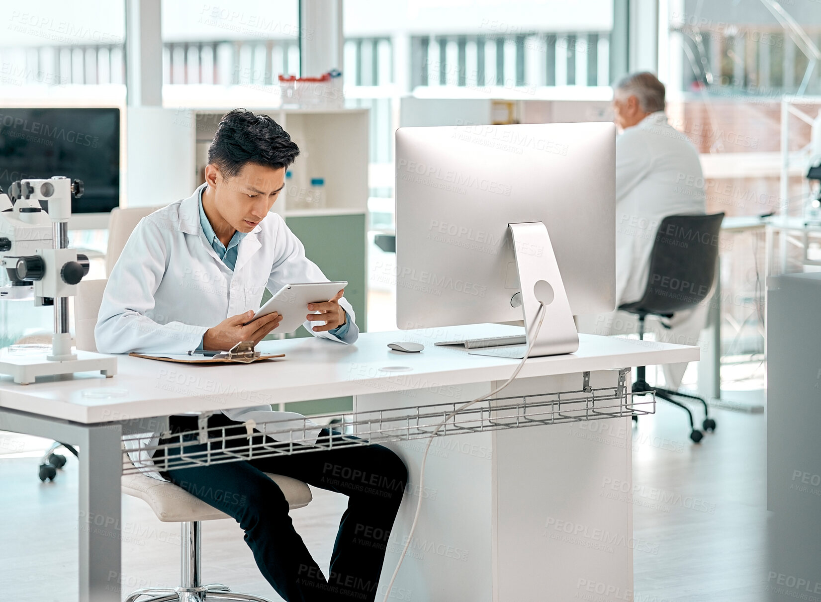 Buy stock photo Man, scientist and tablet for review, analysis and medical research in laboratory as employee or staff. Male person, doctor and tech with results, feedback or pathology for science or breakthrough