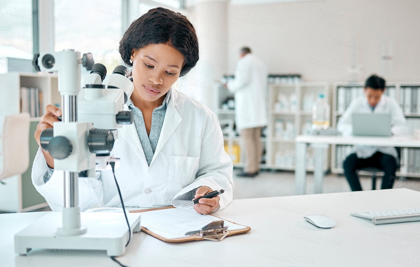 Buy stock photo Scientist, woman with clipboard in lab for microscope notes, research and experiment results of study. Person, biotechnology and writing checklist, medical data and report of pharmaceutical.