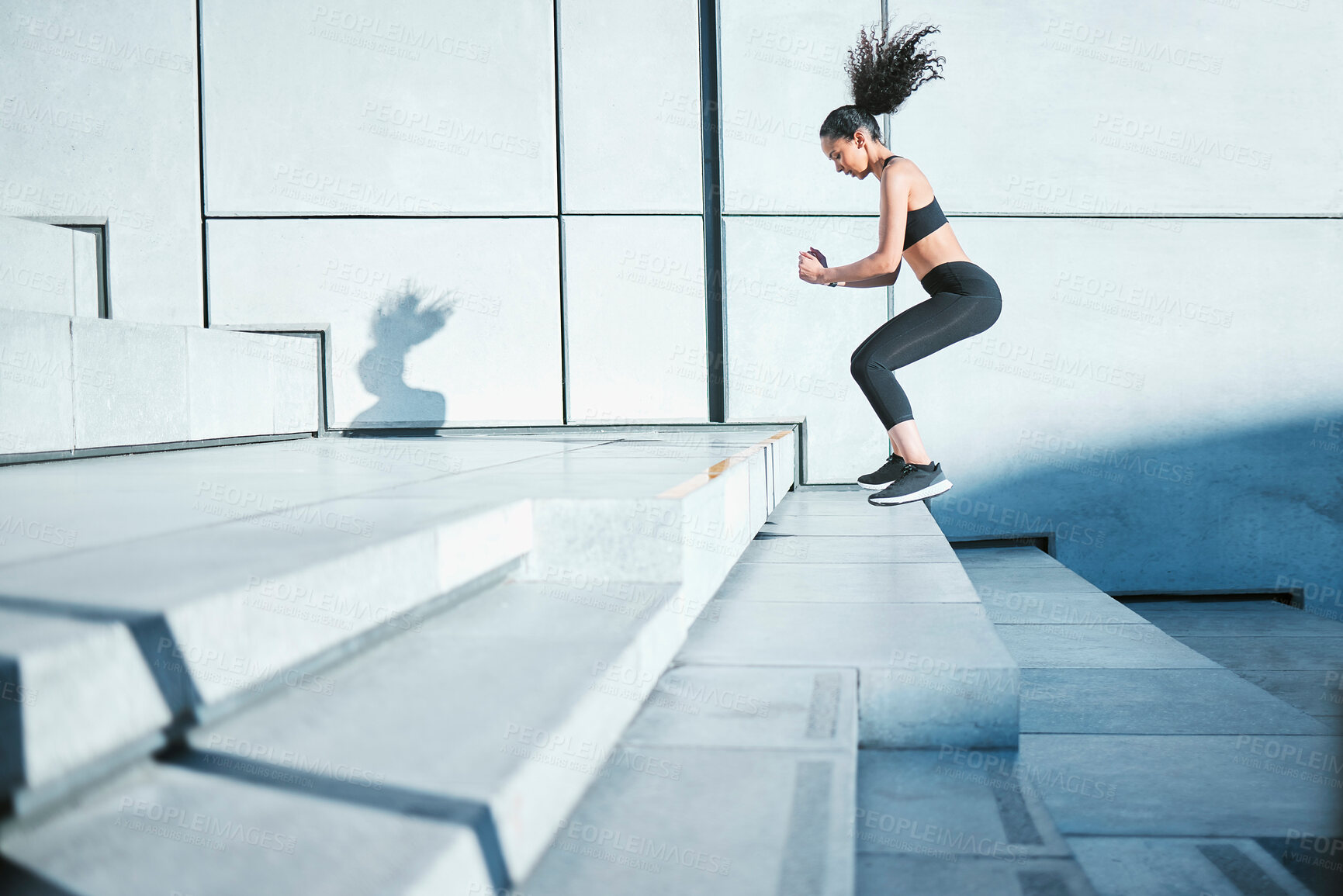 Buy stock photo Training, jump and woman on stairs for fitness, warm up and sports for body energy in city. Challenge, exercise and athlete runner with cardio on steps for marathon, health and workout performance