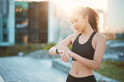 Buy stock photo Fitness, running and watch with sports woman outdoor for cardio exercise or marathon training. Health, time and wellness with athlete person checking or tracking performance, progress and workout