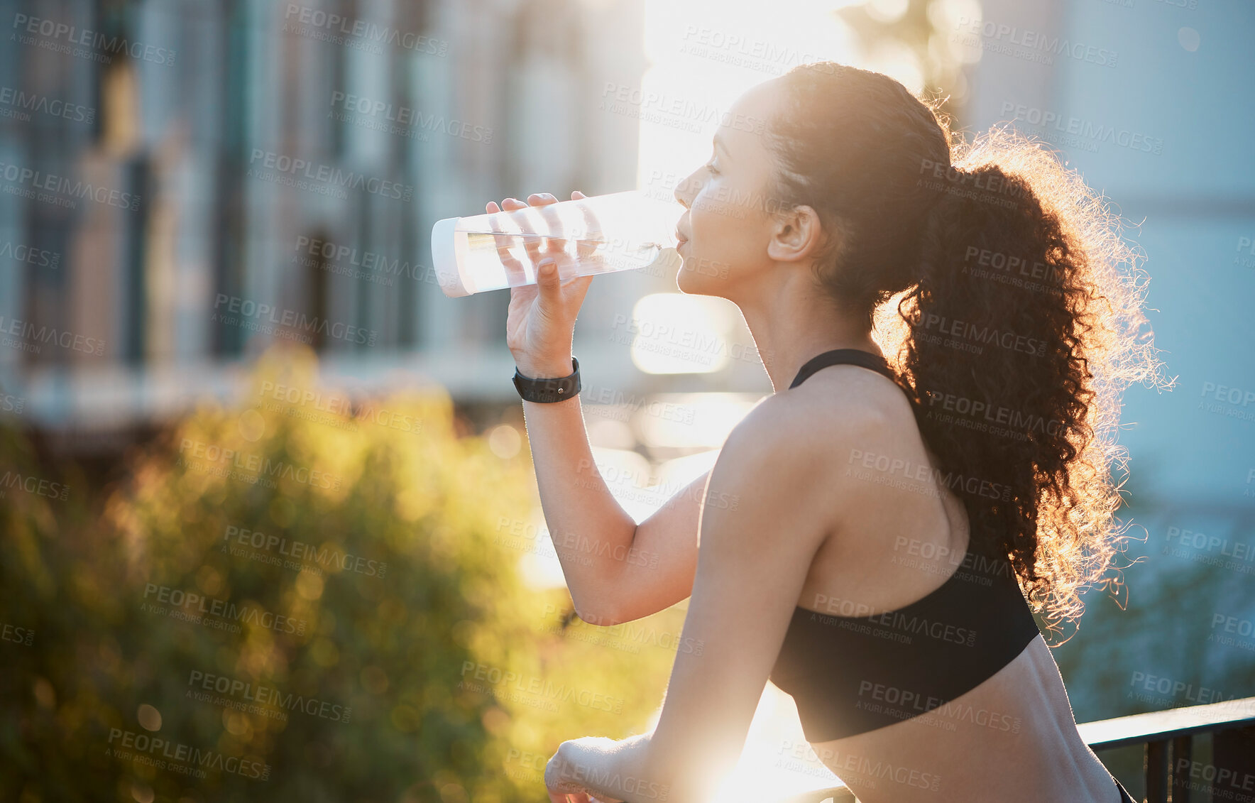 Buy stock photo City, woman and drinking water for fitness or hydration on morning run, exercise and workout in New York. Female person, sportswear and outdoor on training for wellness, wellbeing and self care