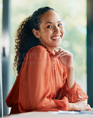 Buy stock photo Cropped portrait of an attractive young businesswoman sitting at her desk in the office