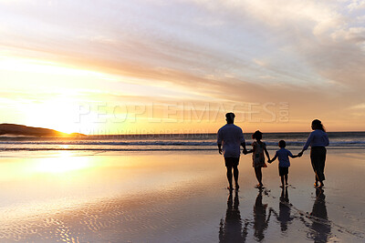 Buy stock photo Beach, family and sunset with silhouette and holding hands for support, security and parent care. Kids, love and back with travel, holiday and ocean with shadow of mom and dad with sea and mockup