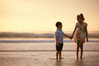 Buy stock photo Beach, hug and children or siblings holding hands, love and support for childhood on summer vacation. Travel holiday, people together and ocean or nature getaway, care and space for bonding
