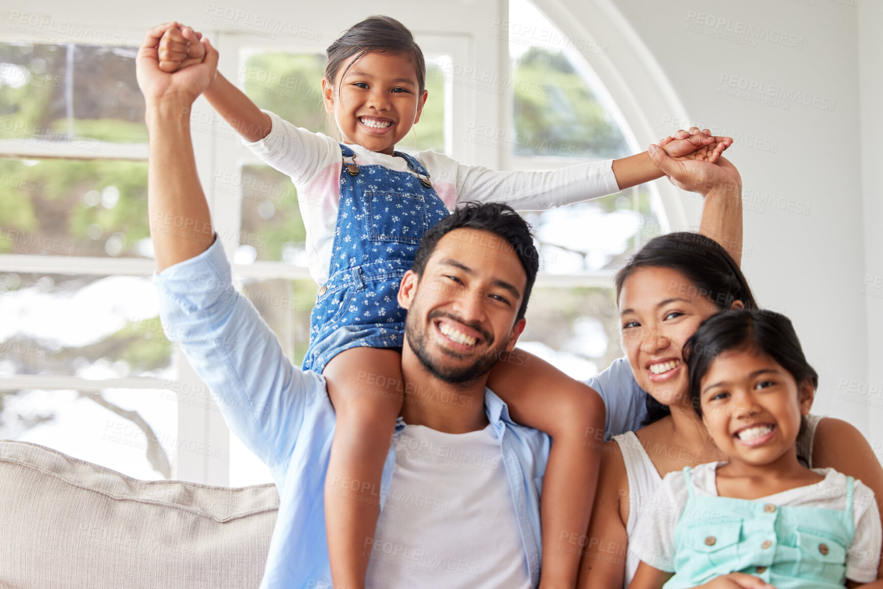 Buy stock photo Happy family, parents and children with portrait in home for bonding, trust and support with love, security or excited. Couple, smile and playing with kids on shoulders in lounge for care and relax