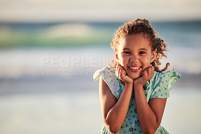 Buy stock photo Shot of an adorable little girl having fun at the beach