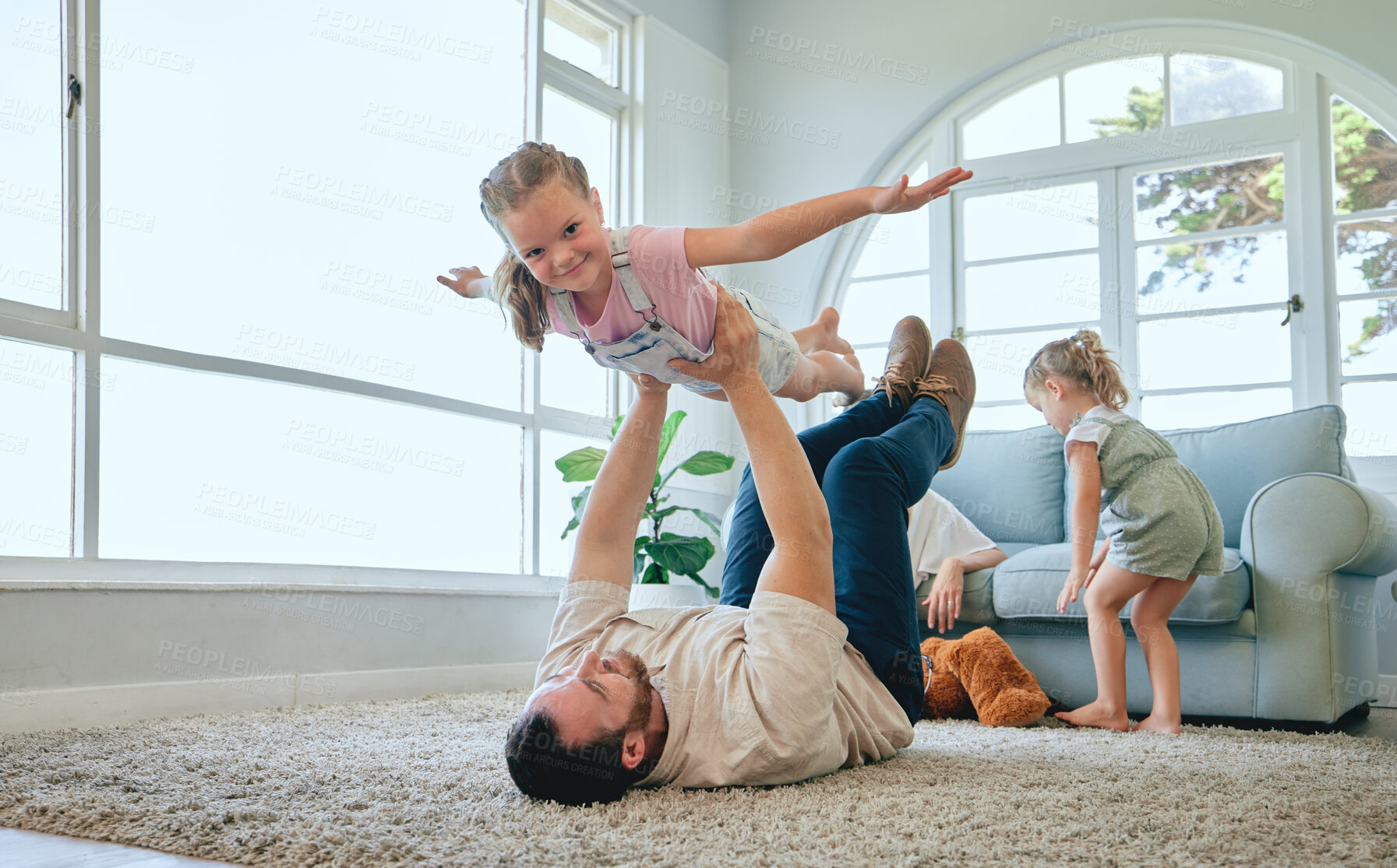 Buy stock photo Airplane, love and father with daughter on house floor for fun, fantasy and playing in their home together. Happy family, bonding and face of kid with dad in living room for flying, games or balance