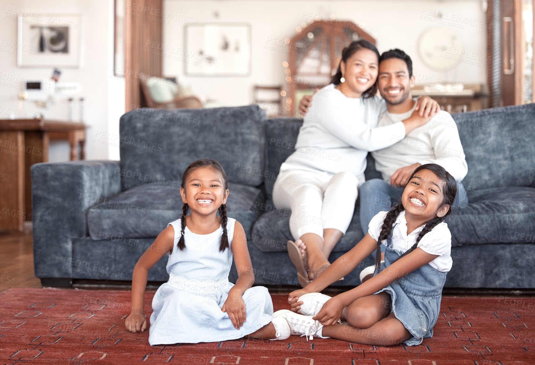 Buy stock photo Asian family, portrait and happy kids with parents in home on sofa for love, care and girls bonding. Mom, dad and sisters on floor in lounge for relax, connection and support for daughters together