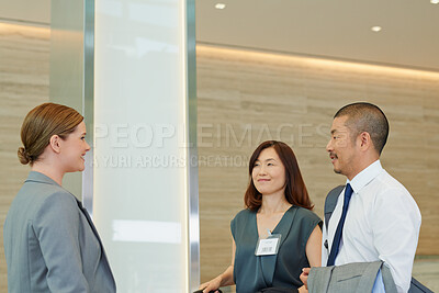 Buy stock photo Business people, hotel concierge and check in at luxury hospitality, corporate travel and asian people. Company employee at receptionist for work convention, travelling and staff book for conference