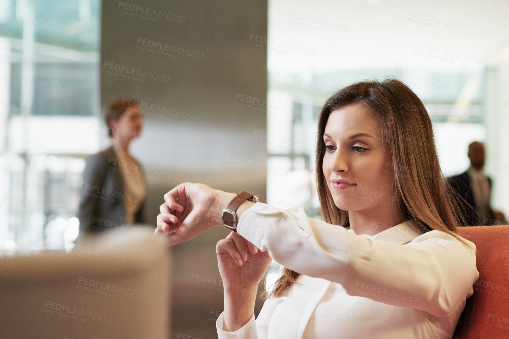 Buy stock photo Time, watch and business woman in a corporate lobby, waiting and working at a company. Management, executive and impatient manager with a smart watch check at a professional lounge for networking