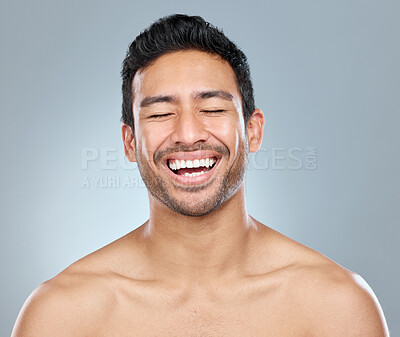 Buy stock photo Man, smiling and beauty studio for dental, happiness and confident for teeth whitening transformation or results. Eyes closed, Asian and male model on background for wellness, mouth care and hygiene