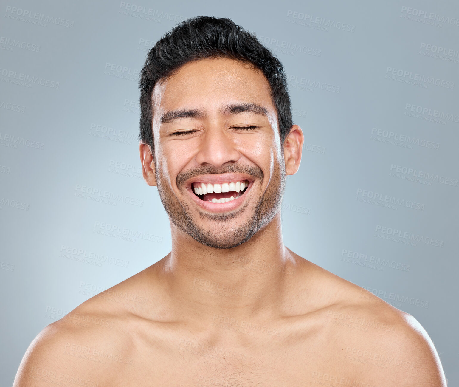 Buy stock photo Man, smiling and beauty studio for dental, happiness and confident for teeth whitening transformation or results. Eyes closed, Asian and male model on background for wellness, mouth care and hygiene