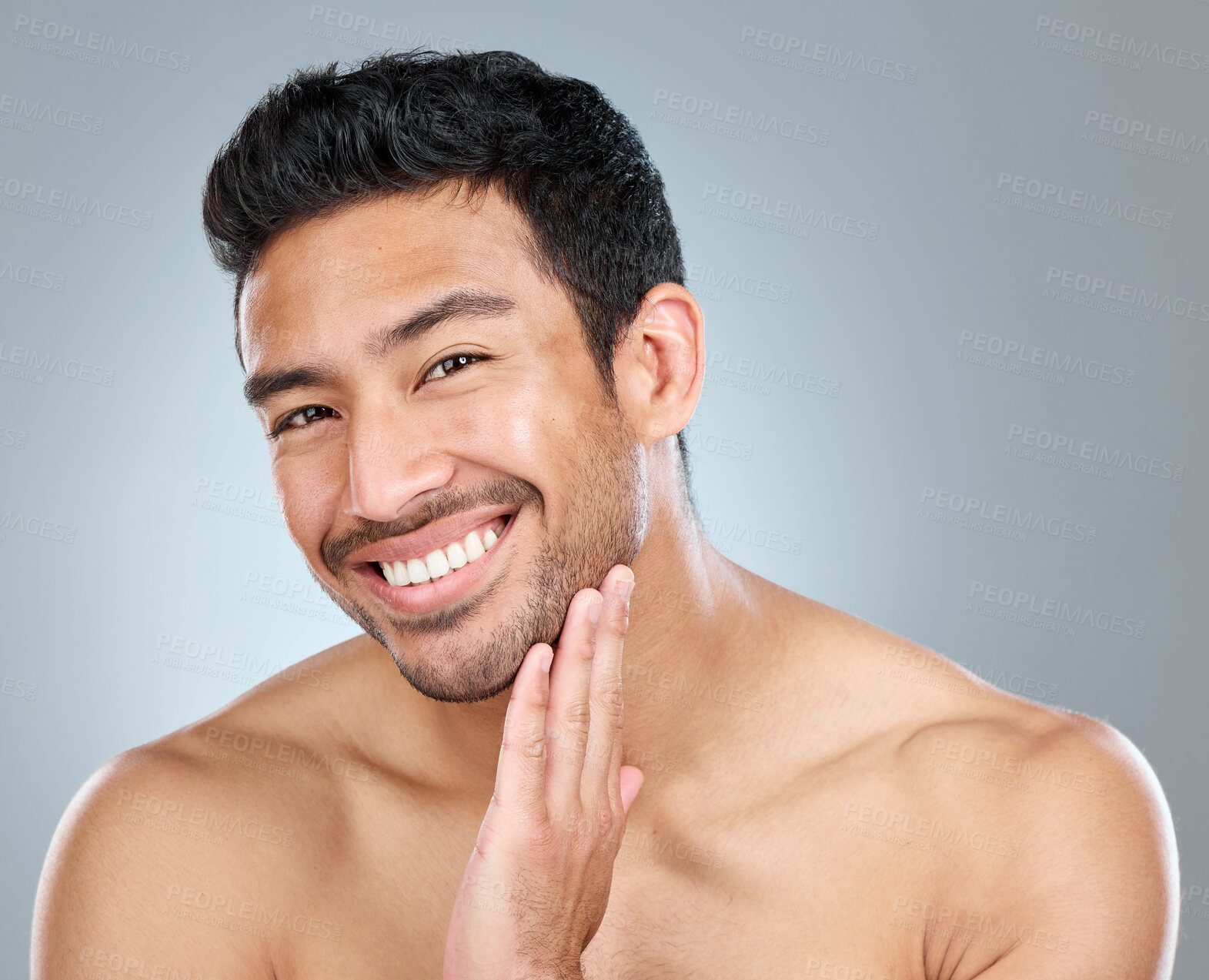 Buy stock photo Beauty, portrait and smile of natural man in studio on gray background for cosmetic wellness. Dermatology, grooming and skincare with face of happy person in bathroom for hydration or hygiene