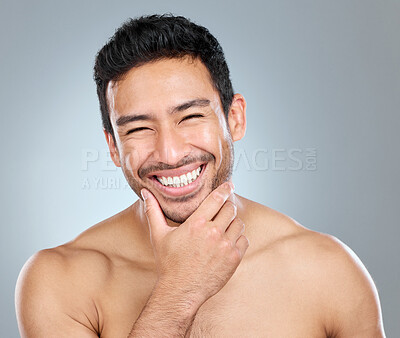 Buy stock photo Beauty, grooming and smile with portrait of man in studio on gray background for cosmetic wellness. Dermatology, masculine and skincare with face of happy person in bathroom for hydration or hygiene