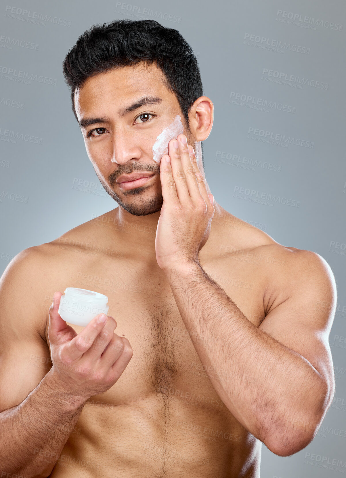 Buy stock photo Asian man, cream and portrait for skincare, beauty and moisturiser on white background. Container, face and grooming from hydration for male person, lotion and bodycare for dermatology and selfcare