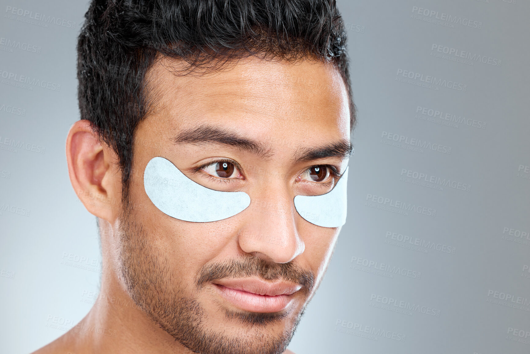 Buy stock photo Portrait, man and eye patch for beauty, thinking and skincare and hands on white background. Studio, dermatology and facial treatment with collagen product, asian person and grooming for anti aging