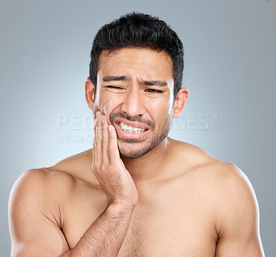 Buy stock photo Pain, man and teeth with hand for toothache, mouth and sore on white background. Dental care, cavity and medical help for gum disease and injury for male person, decay or cheek for healthy in studio 