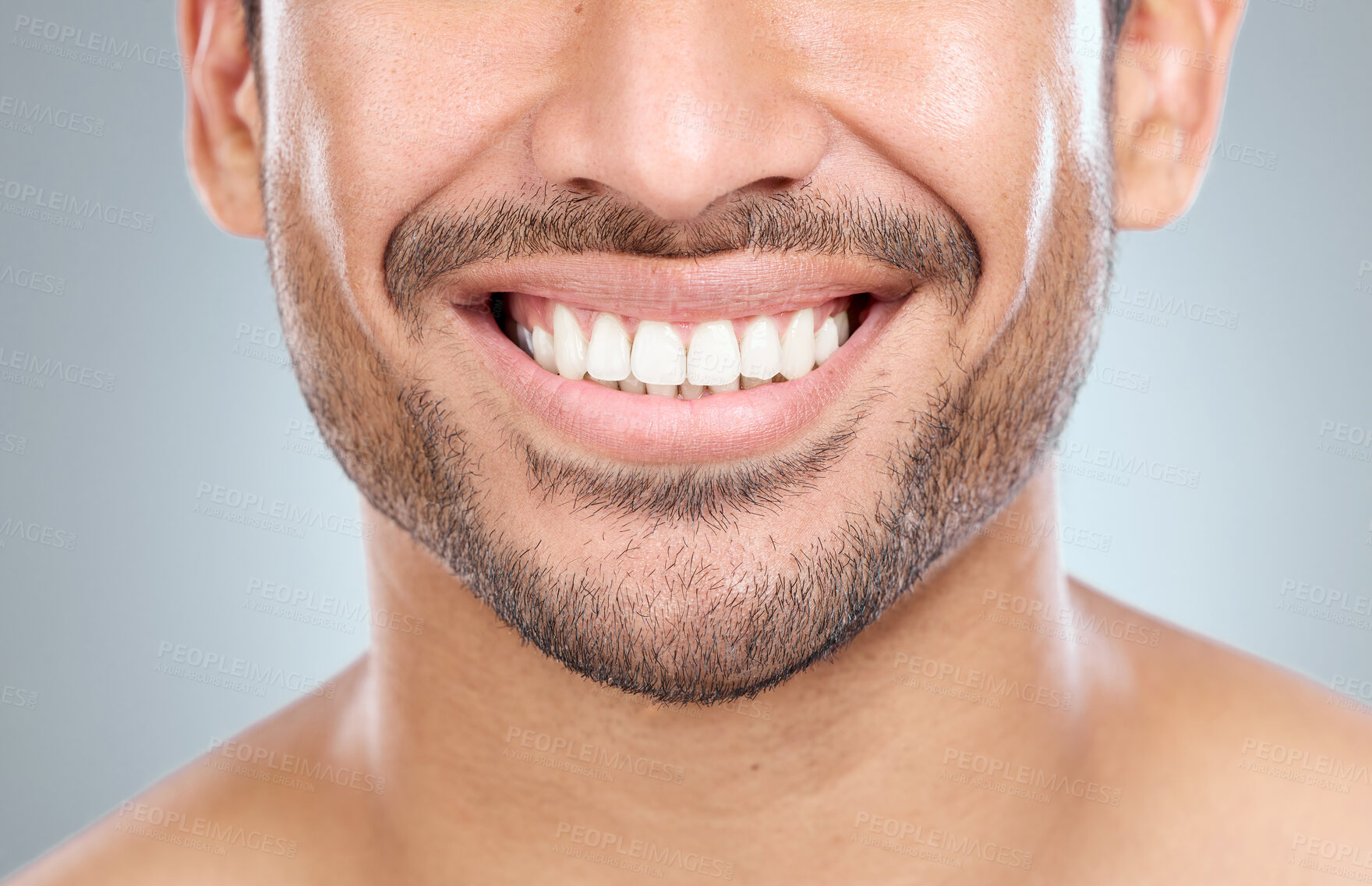 Buy stock photo Man, smile and teeth whitening results in studio, orthodontics and oral health on gray background. Male person, dental hygiene and confidence for wellness, cosmetics and aesthetic of fresh breath