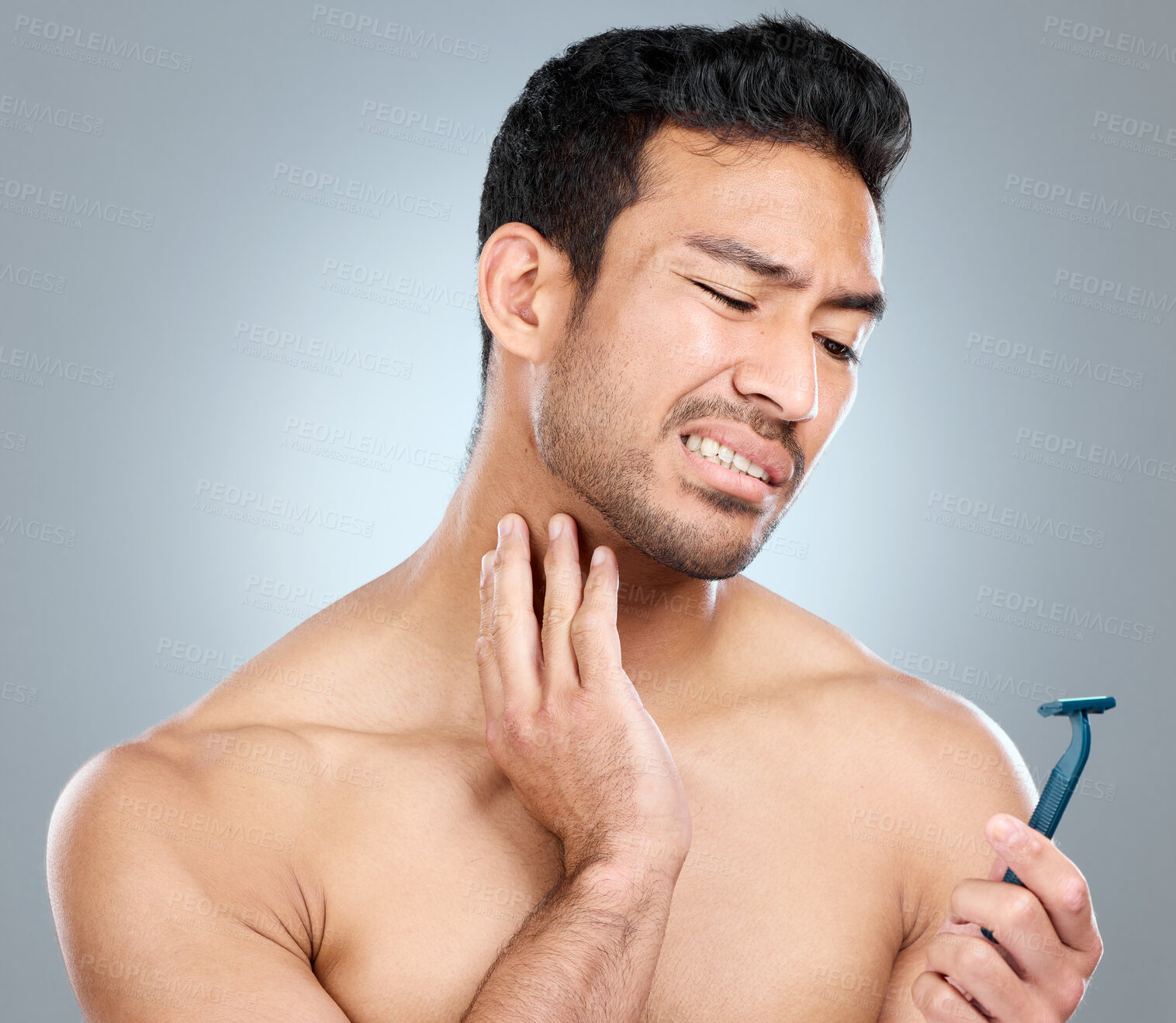 Buy stock photo Model, face and neck shaving injury with self care grooming, health or beard mistake. Pain, man and hair removal accident with cleaning, facial treatment and razor on gray studio background