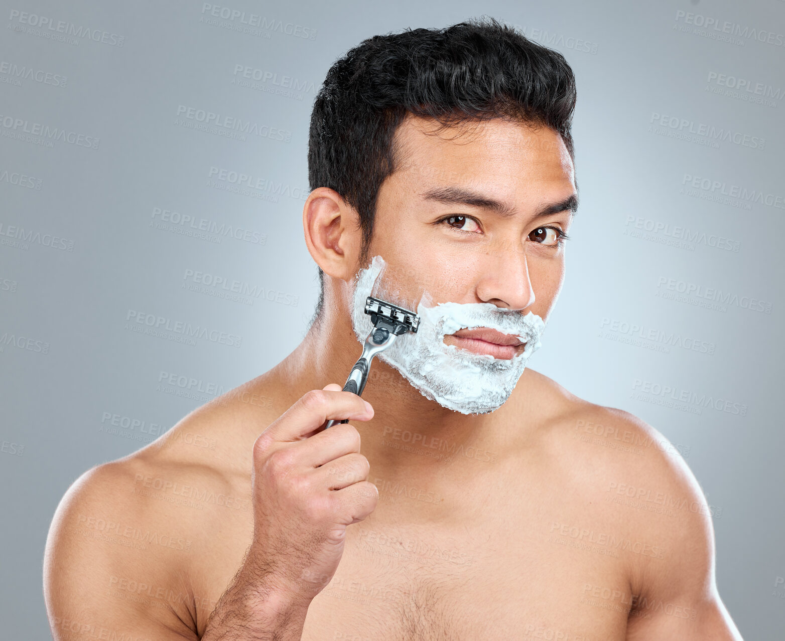 Buy stock photo Beauty, shaving and portrait of masculine man in studio on gray background for cosmetic wellness. Dermatology, natural and razor with face of confident person in bathroom for hair removal or hygiene