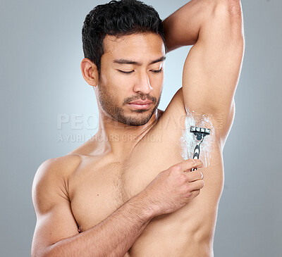 Buy stock photo Shaving cream, armpit and model with razor in studio isolated on a gray background. Epilation, cleaning and shirtless man with cleaning product, foam or gel to shave for wellness or hair removal