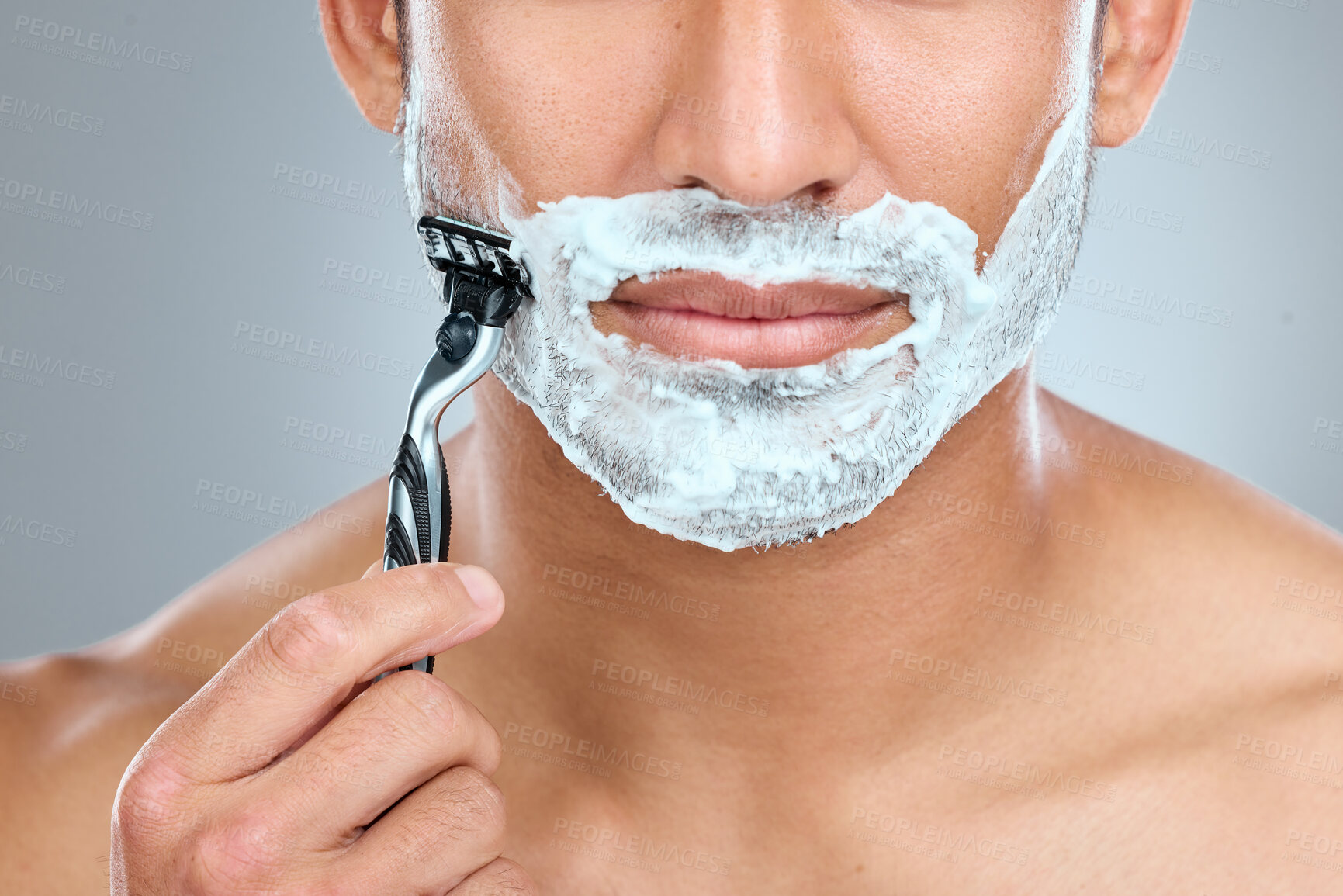 Buy stock photo Shaving cream, mouth and model with razor in studio isolated on a gray background. Epilation, cleaning and shirtless man with facial product, foam or gel to shave for wellness or hair removal