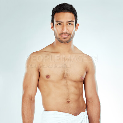 Buy stock photo Body, chest and portrait of asian man in a towel in studio for cleaning, hygiene and care on white background. Face, confidence muscular Japanese model with glowing skin grooming results after shower