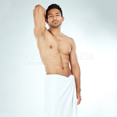 Buy stock photo Shower, towel and portrait of asian man body in studio for wellness, cosmetics or cleaning on white background. Bathroom, face and Japanese male model with confidence, attitude or spa aesthetic pose
