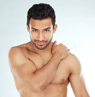 Buy stock photo Skincare, body and portrait of asian man in studio for wellness, cosmetics or treatment on white background. Beauty, face and muscular model with hand on shoulder for smooth skin dermatology results
