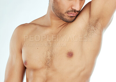 Buy stock photo Body, closeup and man smelling armpit in studio for wellness, hygiene or control on white background. Underarm, care or guy model with sweat, scent or odor check after shower, cleaning or grooming