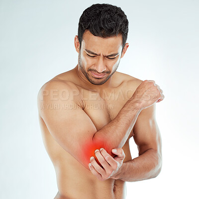 Buy stock photo Elbow pain, stress and asian fitness man in studio with muscle tension, arthritis or inflammation on white background. Sports, arm injury and Japanese male model with fibromyalgia or osteoporosis