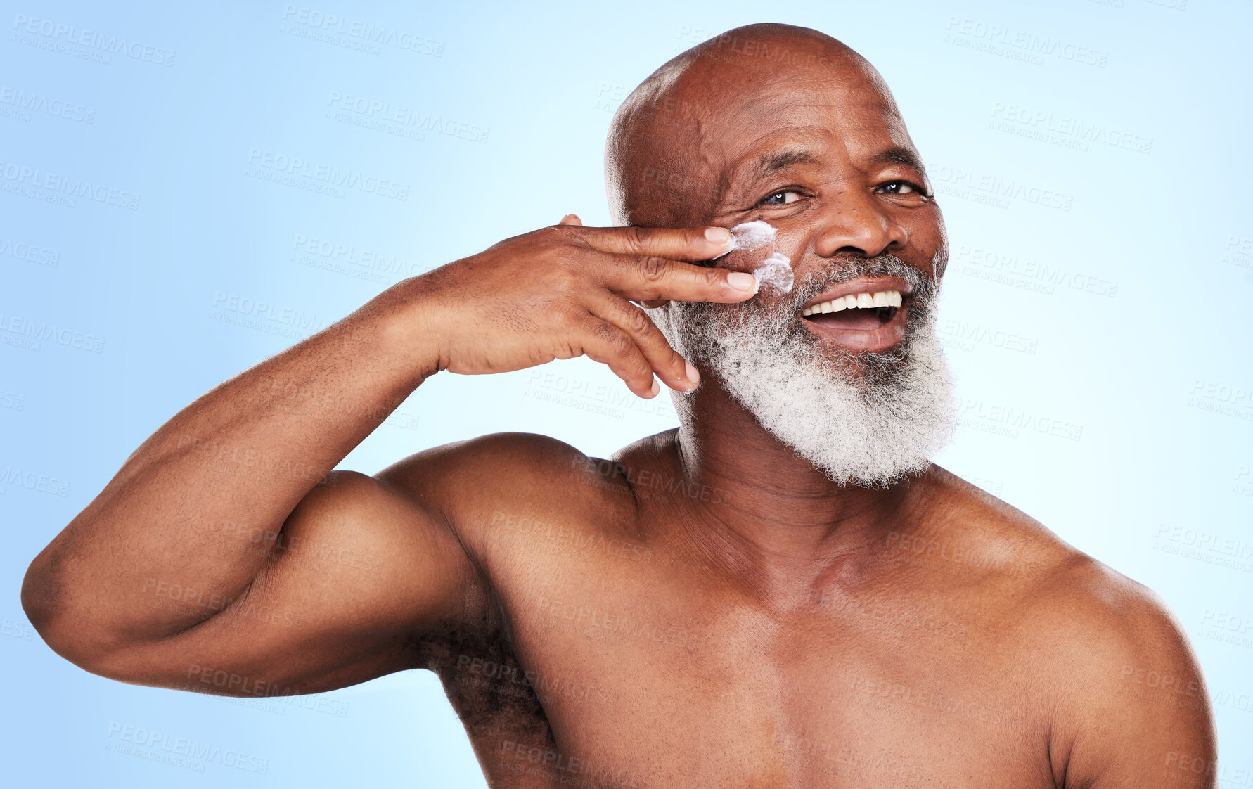 Buy stock photo Portrait, happy and senior black man with cream studio for dermatology, wellness and sunscreen. Smile, African male person and healthy glow and moisturizer by blue background for anti aging routine