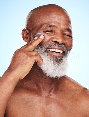 Buy stock photo Dermatology, hands and senior African man in studio for sunscreen, wellness and skincare. Smile, black male person and healthy glow, shine and aesthetic by blue background for retirement or morning