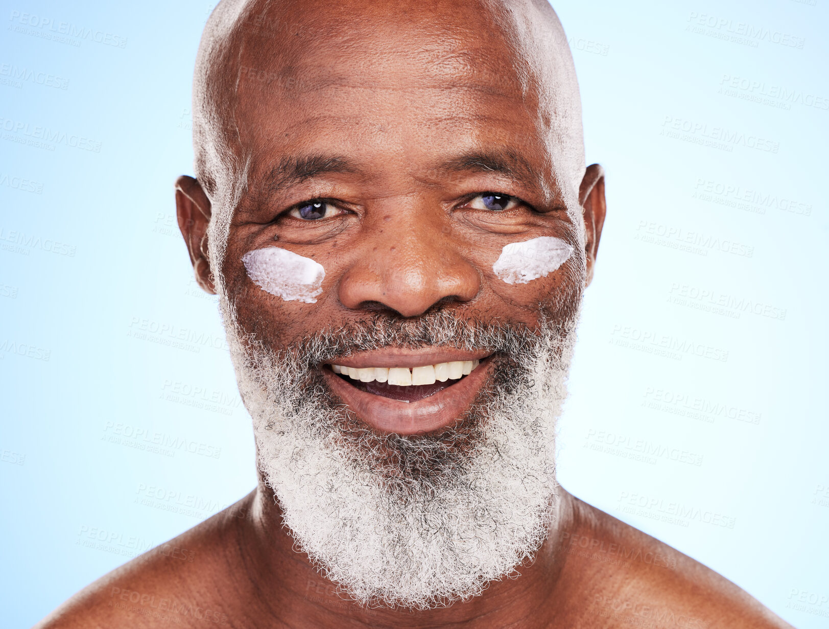 Buy stock photo Sunscreen, portrait and senior African man in studio for dermatology, wellness or skincare. Happy, black male person and healthy glow, shine and aesthetic by blue background for retirement or morning