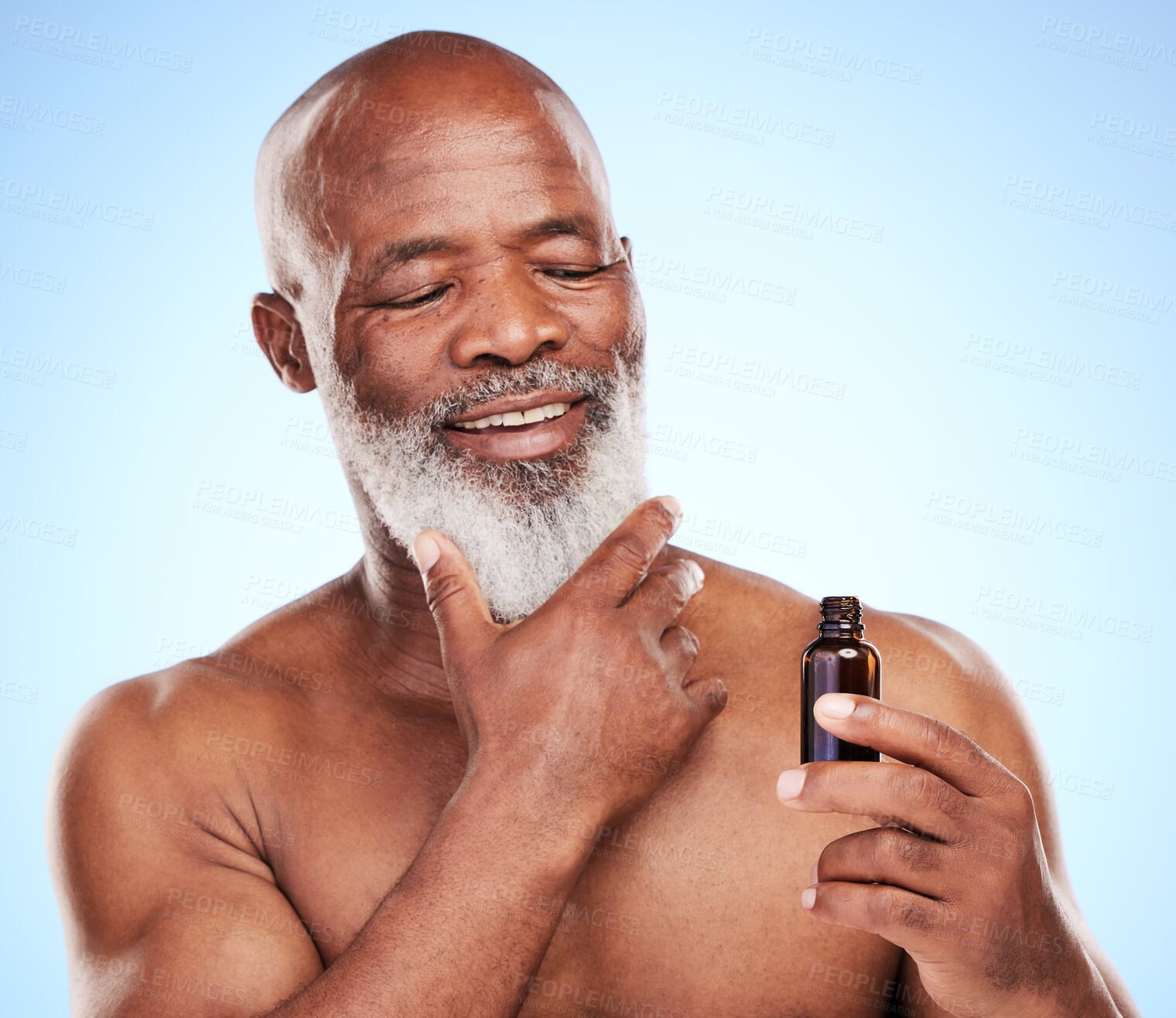 Buy stock photo Black man, serum and beard beauty in studio, senior treatment and bottle on blue background. Elderly person, thinking and essential oil for skincare, application and moisturizing for dermatology