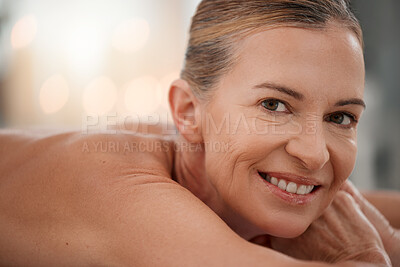 Buy stock photo Spa treatment, portrait or mature woman on bed for massage, physical therapy or luxury. Smile, peaceful or female person in health resort for destress, rest or wellness in hotel for pamper or me time