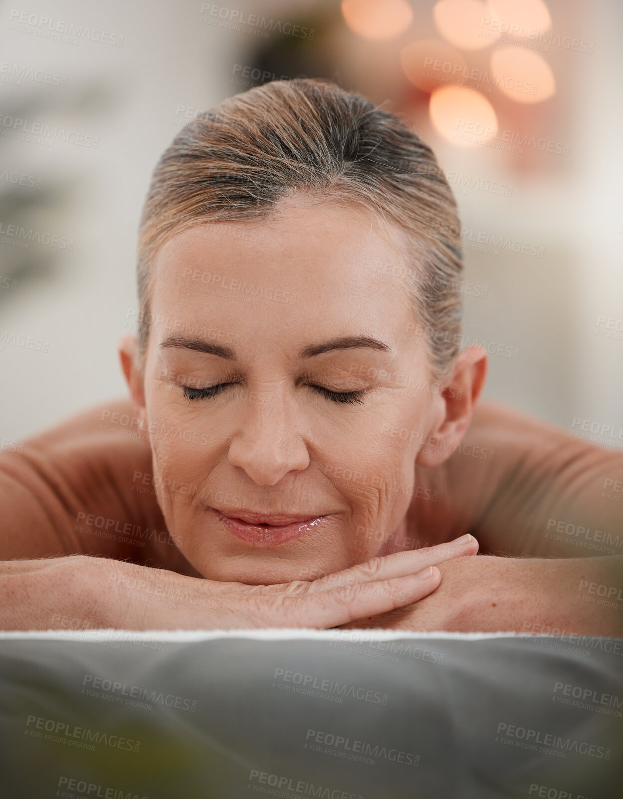 Buy stock photo Calm, woman and sleeping in spa for relax, massage therapy and luxury for wellness on bed. Senior female person, retirement and zen in hotel or beauty salon for holistic health, detox and self care 