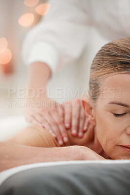 Buy stock photo Shot of a mature woman receiving a back massage