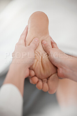 Buy stock photo Shot of a masseuse giving a client a facial massage
